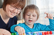 Mother and son playing together