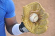 Ball in baseball light brown glove