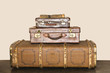 Photo: Old suitcases stacked up Old suitcases stacked up