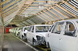 cars in a row at car plant
