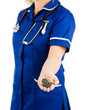 nurse holding tablets