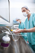 Man and woman washing hands
