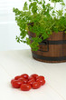 cherry tomatoes on the table, parsley in background