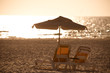 beach chairs with umbrella on beach