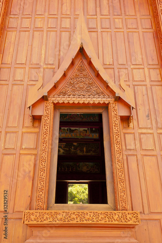 Photo: Windows of modern Thai teak temple Windows of modern Thai teak temple