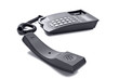 Photo: Black telephone isolated on white with space for text Black telephone isolated on white with space for text
