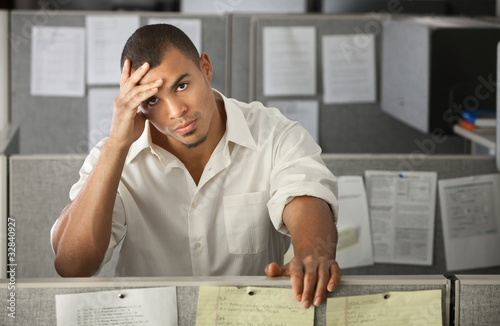 Photo: Overworked Male Office Worker Overworked Male Office Worker