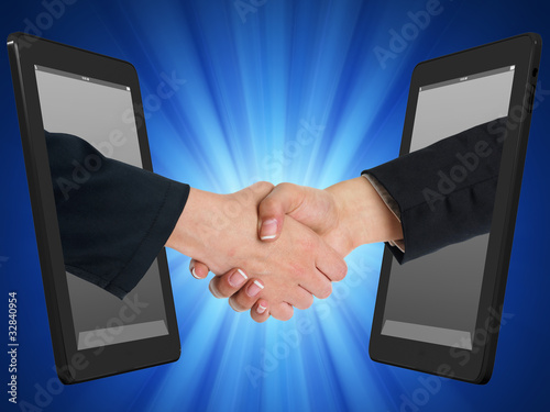 Photo: Wireless Internet Handshaking Concept with Tablet Computer Wireless Internet Handshaking Concept with Tablet Computer