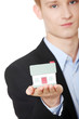 Young business man holding house model
