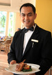 restaurant waiter holding food