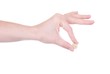 Polish Zloty coin in female hand isolated