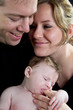 Baby mit ihren stolzen Eltern