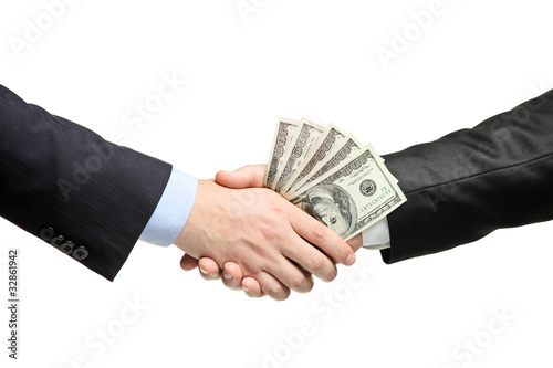 Photo: Handshake with money Handshake with money