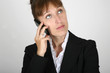 Young businesswoman speaking at the phone