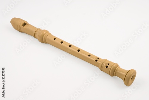 Photo: plastic soprano flute on a white background plastic soprano flute on a white background