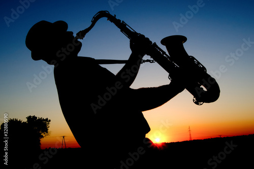 Photo: Saxophonist at sunset Saxophonist at sunset
