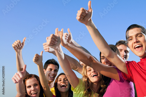 Photo: Friends showing thumb up Friends showing thumb up