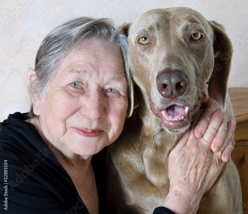 Photo: Senior woman and dog Senior woman and dog
