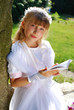 girl going to the first holy communion