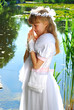 girl going to the first holy communion