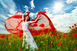 Foto: beauty woman in poppy field with tissue beauty woman in poppy field with tissue