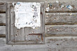 Old bill-board on a barns wall