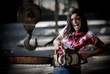 Psychotic woman with a bloody chainsaw.Vendetta/blood revenge.