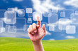 hand pushing button on blue sky