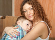 Mother holding her son.