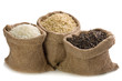 Uncooked rice in small burlap sacks