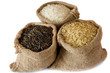 Uncooked rice in small burlap sacks