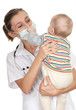 Photo: child at doctor - female doctor examining baby boy child at doctor - female doctor examining baby boy