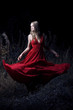 Portrait of dancing woman at forest