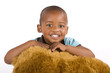 Adorable 3 year old black boy with toy bear smiling very happily Adorable 3 year old black boy with toy bear smiling very happily