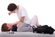 child crying on the floor child being beaten by a teenager