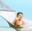 girl in the hammock on the beach