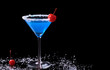 Blue Curacao with coconut flake and maraschino cherry