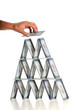 Photo: Man's Hand Building House of Cards Man's Hand Building House of Cards