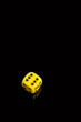 single yellow dice
