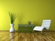 Wohndesign - Ledersessel vor grüner Wand