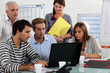 Young team working at a laptop