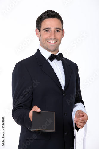 Photo: Waiter with a menu Waiter with a menu