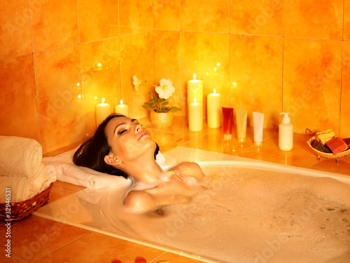 Photo: Woman take bubble bath. Woman take bubble bath.