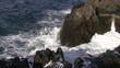 Wave Crashing Onto The Rocks