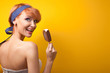 Happy woman eating ice cream