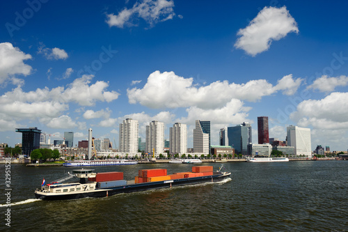 Photo: Rotterdam skyline and container ship Rotterdam skyline and container ship