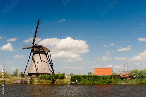 Photo: Windmill landscape at Kinderdijk The Netherlands Windmill landscape at Kinderdijk The Netherlands