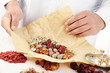 Photo: Doctor wrapping Chinese traditional herbal medicine. Doctor wrapping Chinese traditional herbal medicine.