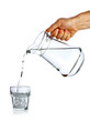Hand pouring water from glass jug Hand pouring water from glass jug
