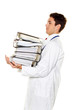 Doctor on stress with stacks of files